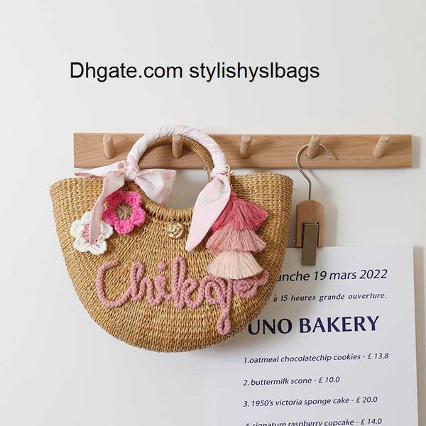 

evening bags cute camellia thai straw bag 2022 new niche design natural straw bag hand-held rattan bag