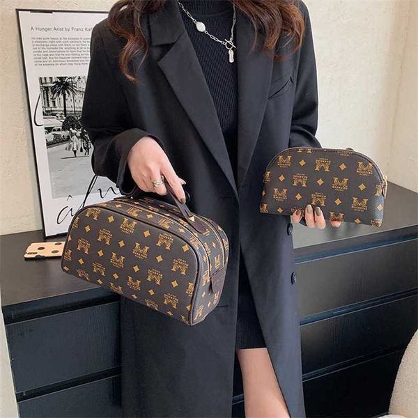 

designer bag 2023 hand new large-capacity cosmetic portable simple waterproof wash travel skin care products storage