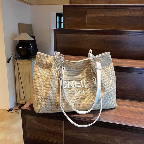 

designer bag 2023 hand grass woven large capacity fashionable tote casual and versatile westernized one shoulder crossbody embroidered women