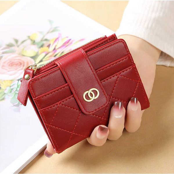 

the new korean version of women's wallet is versatile and trendy with multiple card slots and short designs. it is small and compact wi