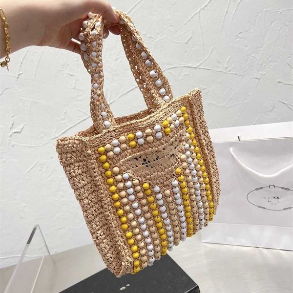 

designer bag 2023 handbag ins new handbag women's autumn easy to wear straw woven handheld small square