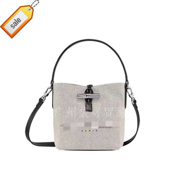 

women's designer bags high version 2023 new french longxiang bamboo joint canvas bucket bag single shoulder handheld diagonal straddle