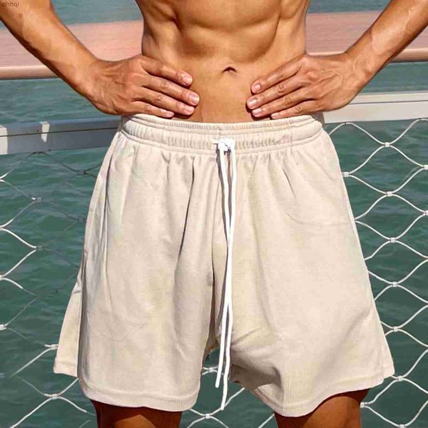 

new muscle fitness summer sports casual waffle shorts men's running training suit 5/4 pantsea, White;black