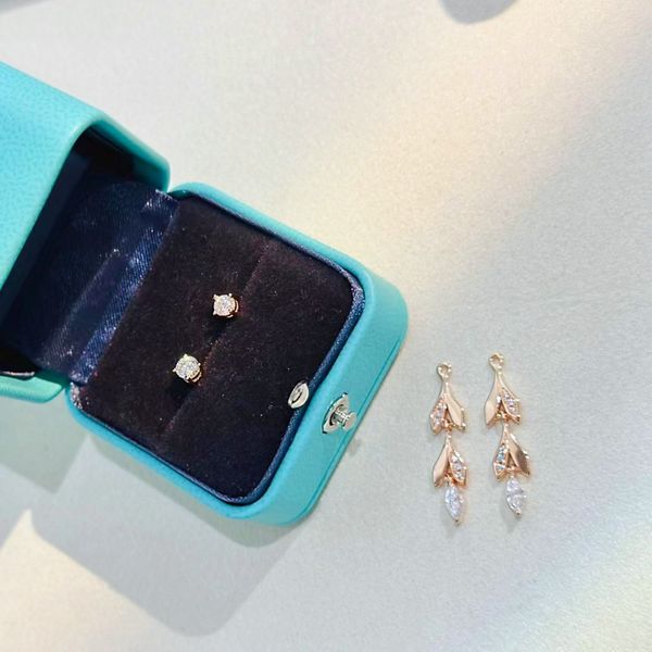 

brand name women's leaves with diamond earrings fashion designer earrings girls festival gifts factory wholesale and retail with box, Golden;silver