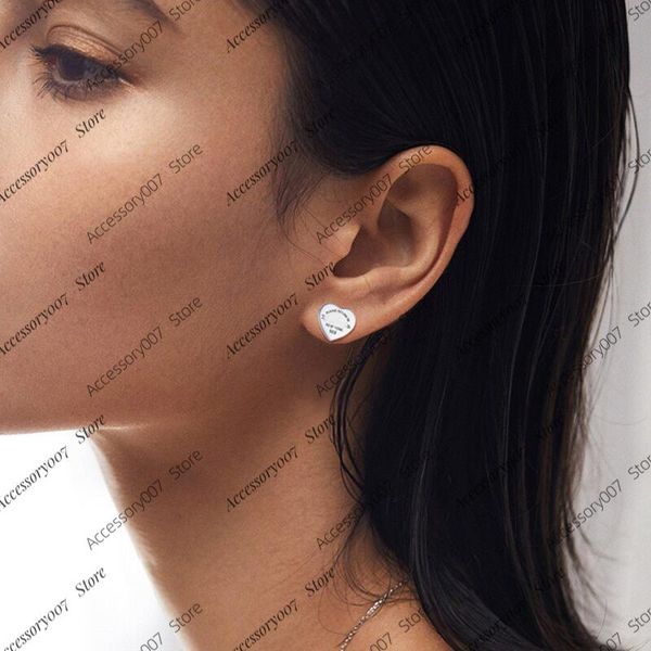 

designer earrings designer jewelry stud earrings heart tiffaany captivating brilliance reinvented jewelry adorn yourself with mesmerizing be, Golden;silver