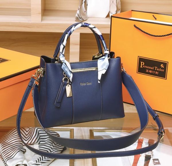 

women's bag 2023 genuine leather black middle aged women's commuter tote bag large capacity fashion one shoulder crossbody bag