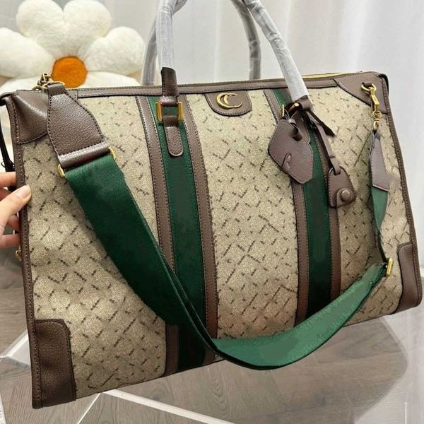 

high-end men's travel bag design shoulder handbag brand leather print play tote luggage women's fashion outdoor business wide shou