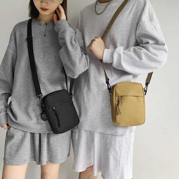 

student canvas bag female small black bag crossbody harajuku ulzzang version mobile phone bag men's and women's shoulder bag