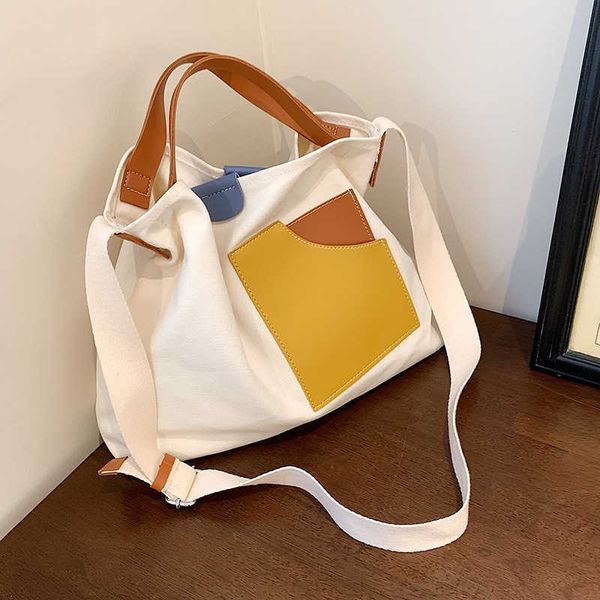 

ins niche design splicing canvas bag version women's shoulder bag commuter tote bag versatile leisure messenger bag