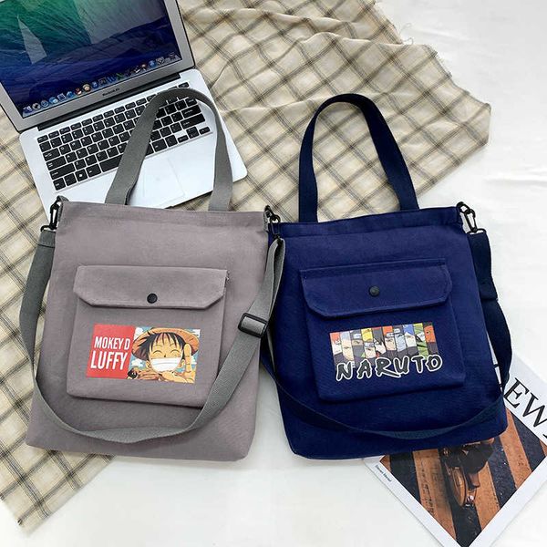 

2023 spring new cartoon fire shadow student multi use large capacity canvas bag ins wind one shoulder crossbody repair bag