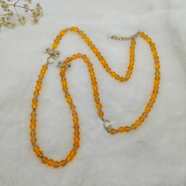 

2023 luxury quality knot shape sweater pendant necklace with diamond and yellow beads in 18k gold plated have stamp ps7201b, Silver