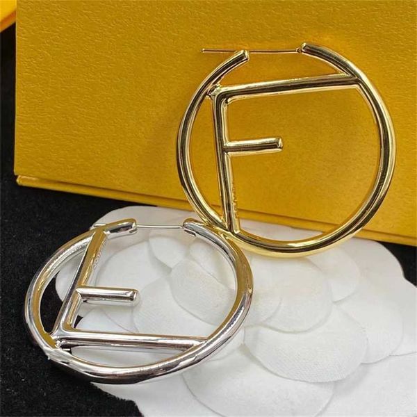 

2023 fenjia f letter pair of different colors brass material silver needle fashion versatile earrings for women, Golden