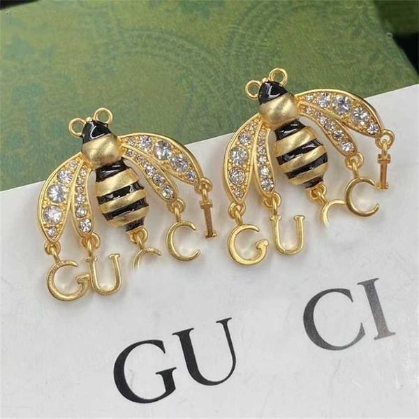 

2023 gujia little bee dropping glue rhinestone letter popular design french 925 silver needle earrings, Golden