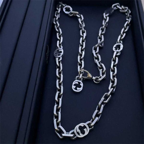 

2023 gujia 925 silver vintage letter interlocking necklace with hollowed out personality trend ins for both men and women