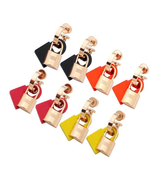 

europe america simple style lady women titanium steel tassels engraved h initials rubber and metal lock stud earrings 3 color2076127, Golden;silver