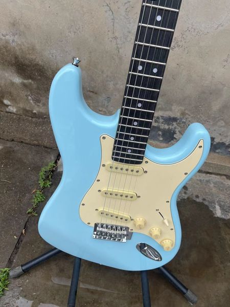 

light blue and traditional guitar fast ship