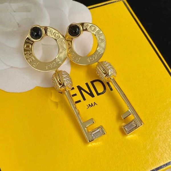 

parent's round letter key f rhinestone fashion brass silver needle earrings, Golden