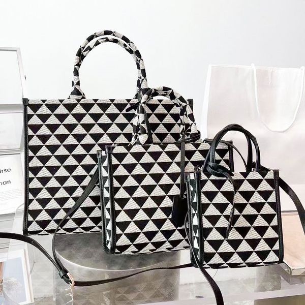 

designer handle bag symbole embossed canvas shopping bags cross body triangle clutch tote prad womens stuff sacks handbag pochette luxury sh