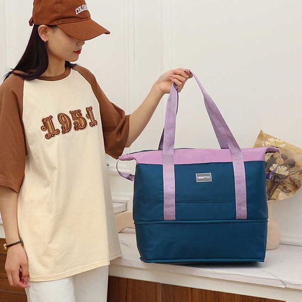 

2023 new sports fitness bag women's splice large capacity extended short distance travel bag waiting for production luggage backpack