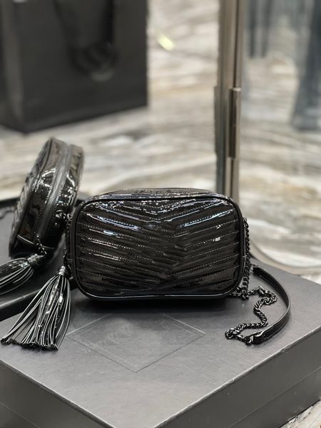 

cowhide camera bag crossbody bag with stylish fringe hanging inside and out full leather shoulder bag with slot in the bag is very practical