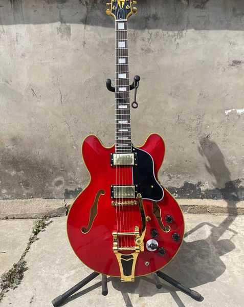 

red rocking bar tremolo sg guitar of fast rosewood neck and fretboard