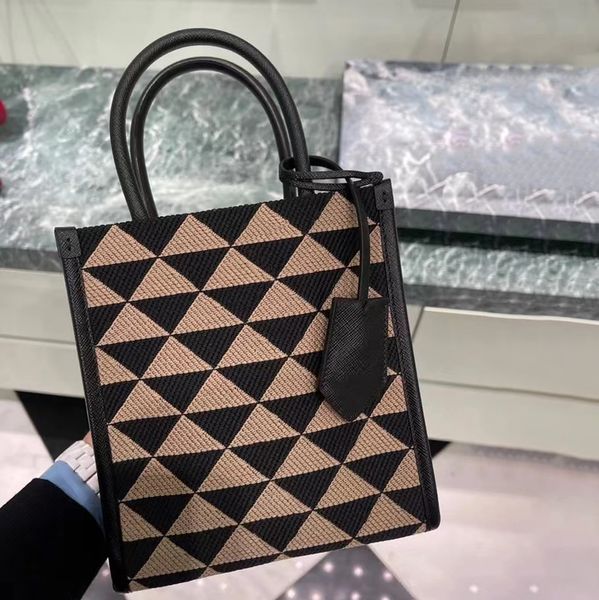 

luxury triangle symbole 3sizes embossed prad underarm bags women designer duffle clutch handbags luggage bag men purse weekend canvas cross