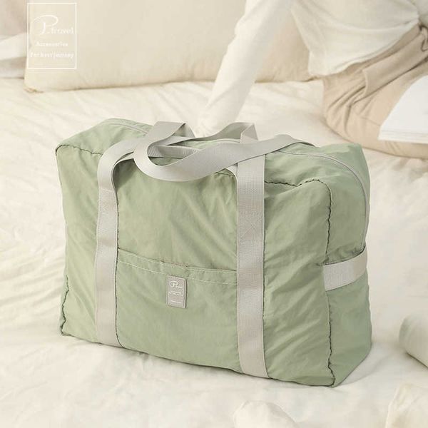 

2023 new travel storage bag foldable oblique straddle travel portable large capacity fresh color clothing luggage bag