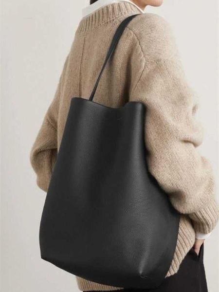 

the row bag genuine leather one shoulder handheld high capacity and premium feel small group litchi pattern cowhide commuting bucket bag for