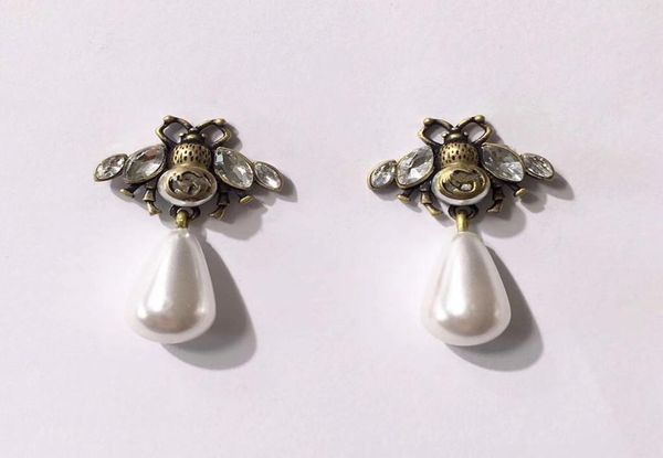 

2018 latest fashion brand bee earrings large pearl earrings flash diamond earrings jewelry9125364, Golden;silver