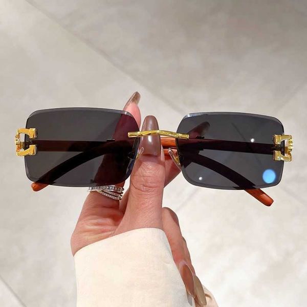 

wholesale of new vintage frameless wood grain leopard head radiation proof sunglasses for outdoor driving korean version high appearance sun, White;black