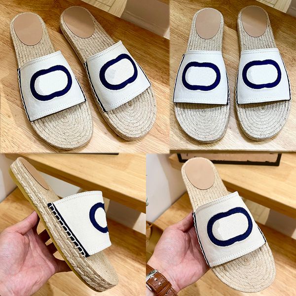 

womens espadrille slide with interlockin white and blue canvas 7258 influenced by an archival design from the 70s embroidered detail aflat d, Black