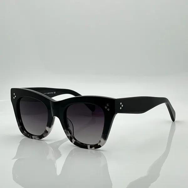 Black Wht Amber Frame Grey Lens