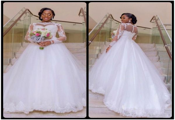 

long sleeve wedding dresses 2020 a line lace bridal gonws appliques lace sweep train dubai illusion sheer bridal gowns6574142, White