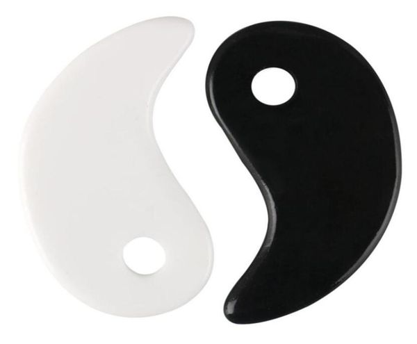 

white black gua sha massage real natural jade stone tai ji shape for scraping facial and body skin spa lifting blood circulation t3734585