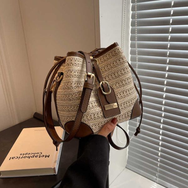 

popular niche design straw woven bag new women's bag summer versatile cross body bag bucket bag