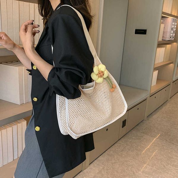 

summer new handheld cabbage basket small flower grass woven bag small qing new one shoulder underarm tote bag