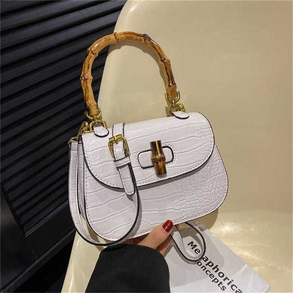

2023 new women's bag high crocodile pattern bamboo knot handbag sweet solid saddle bag fashion crossbody 70% off outlet online gdmc