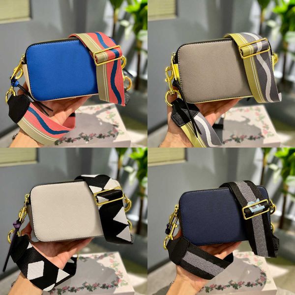 

designer camera bags women luxurys handbag solid color shoulder bagss leather crossbody female oval camera purses 220329