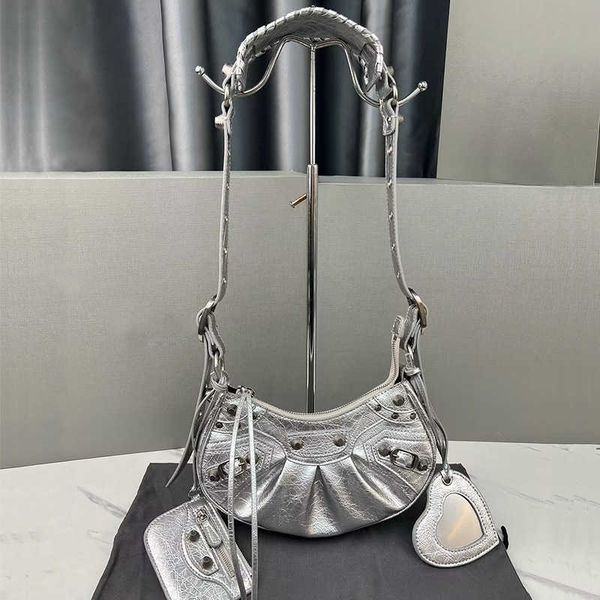 

23 new le cagole rivet locomotive bag sweet cool girl triple fold crescent bag leather underarm bag