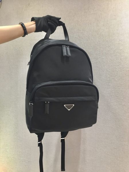 

the 2v066 classic backpack is made of leather and nylon fabric with adjustable nylon straps that are lightweight and stylish with a very lar
