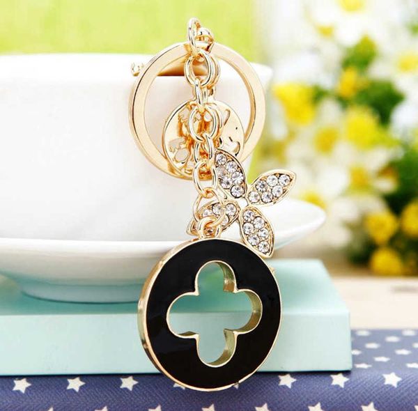 

beautiful keychains four-leaf clover keychain exquisite metal fashion car pendant key ring women's bag charm gift, Silver