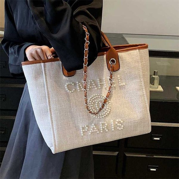 

large capacity canvas tote bag for women's 2023 summer new pearl design tote bag for niche texture underarm bag 50% clearance sale