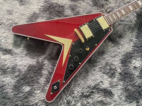 

electric guitar gold hardware flying v transparent red body and neck