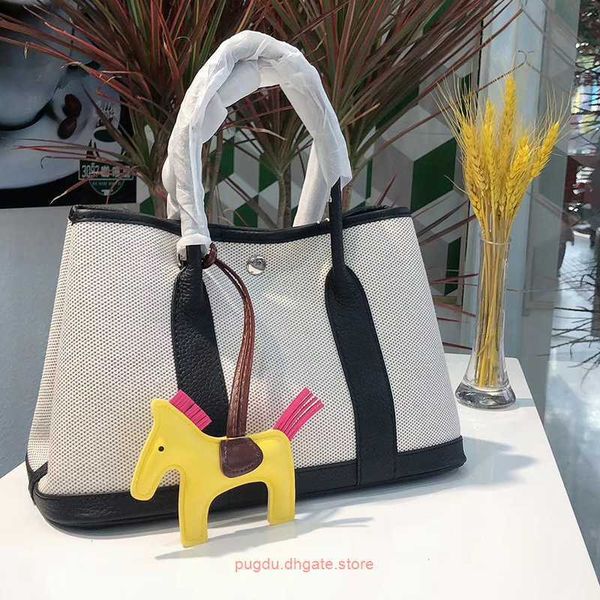 

original wholesale h home party garden tote bags online shop straddle portable 2023 canvas tote bag water shopping womens garden new posta w