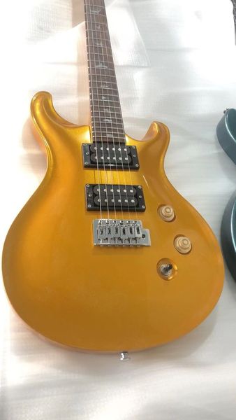 

gold color 6 string electric guitar body and neck chrome hardware