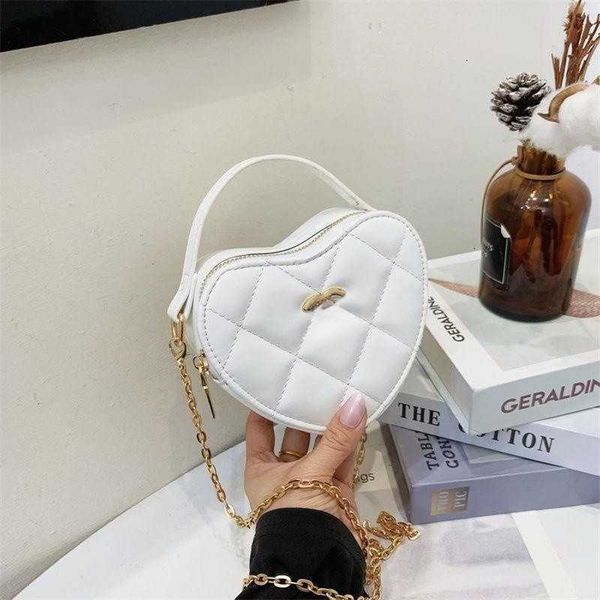 

designer handbag c bag high grade emotional people's day love bag versatile handheld heart shaped peach heart bag charm chain bag mue8