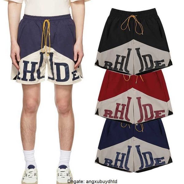

rhude contrasting color patchwork printed elastic drawstring basketball shorts casual mesh comfortable five point shorts for men and women, White;black