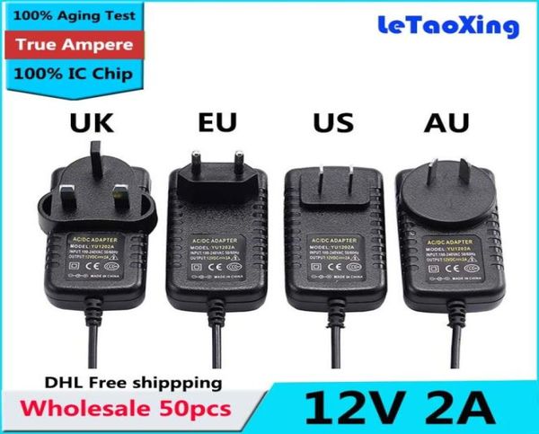 

50pcs ac dc 12v 2a power adapter supply transformer 55mm x 2125mm 24w uk us au eu plug with ic chip dhl 6704486