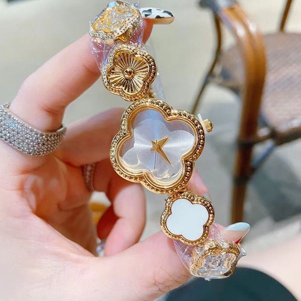 

womens watches three stitches quartz watch luxury steel four-leaf clover shape fashion watch, Slivery;brown