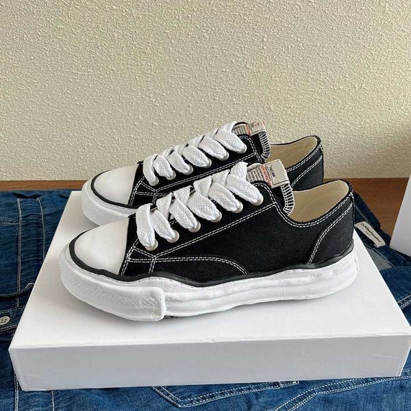 

canvas shoes maison mihara yasuhiro thick soled low cut men's and women's versatile dissolved mmy black white sneakers